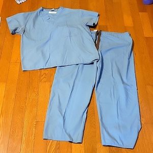 Unisex scrubs. Reversible. Pant with drawstring and Back pocket. Top breast pkt.